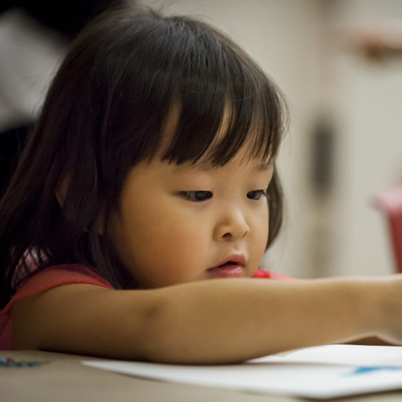 Toddler making art